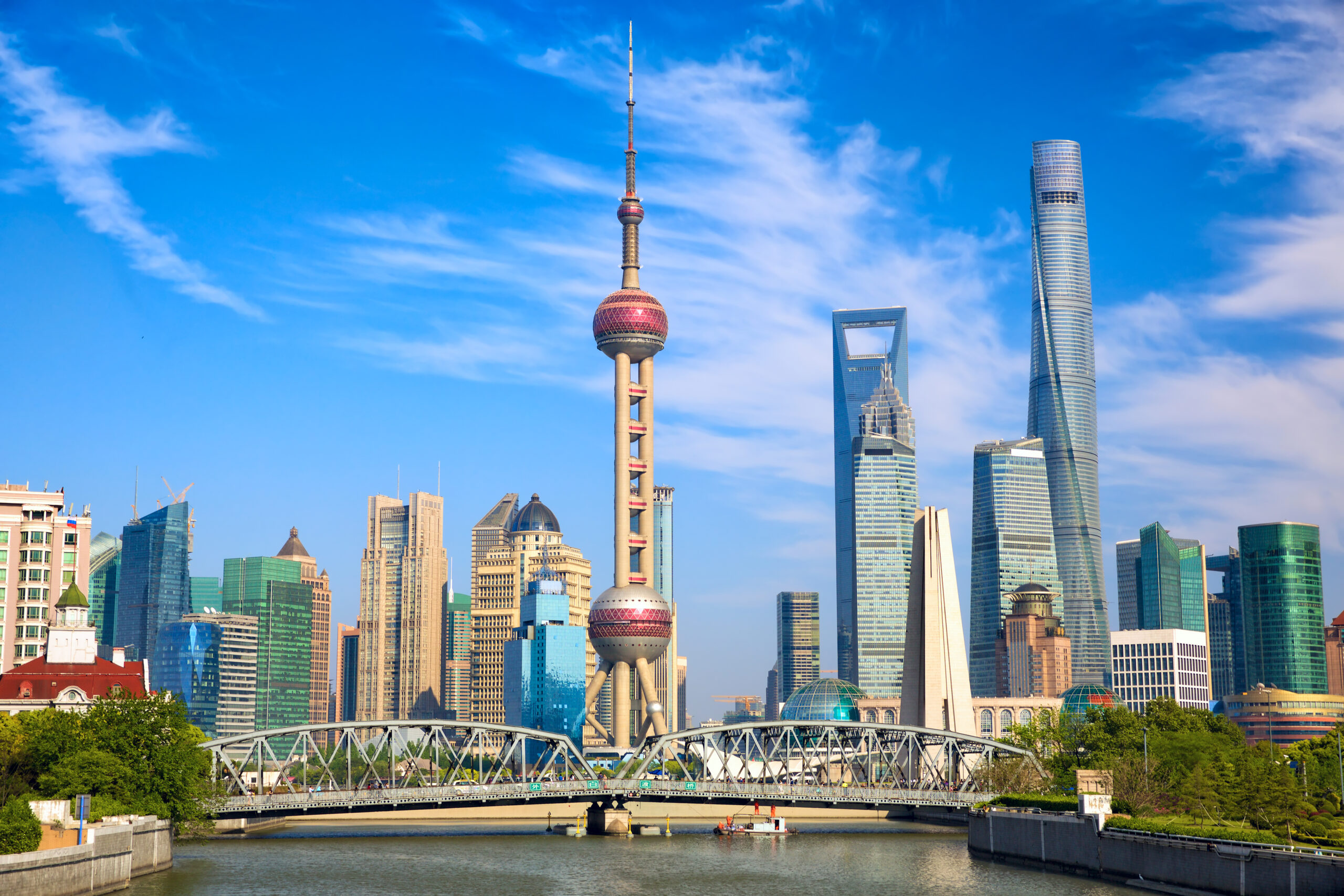 Shanghai skyline with historical Waibaidu bridge, China