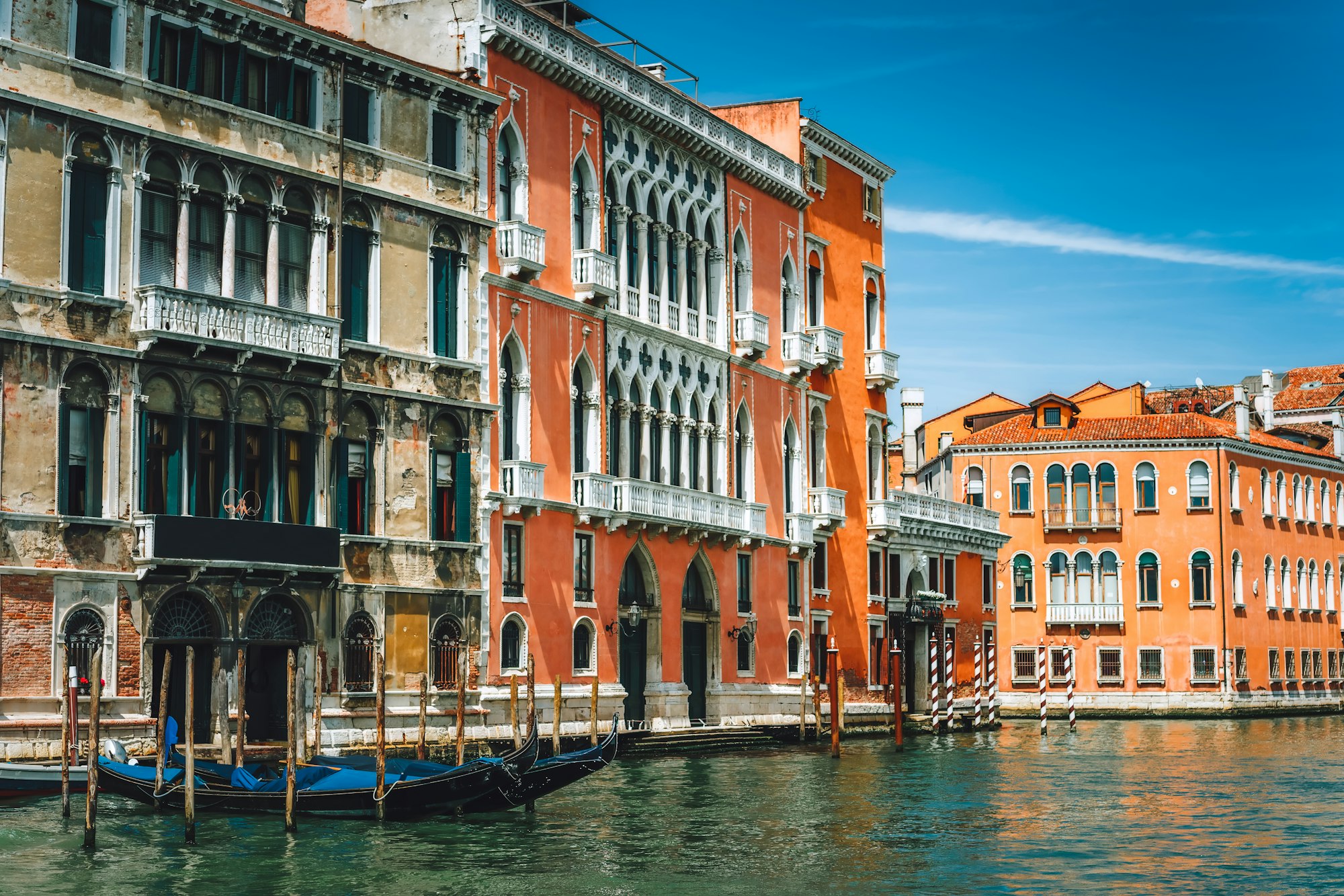 Old ancient facades of houses on Grand Canal, Venice, Italy. Vintage hotels and residential