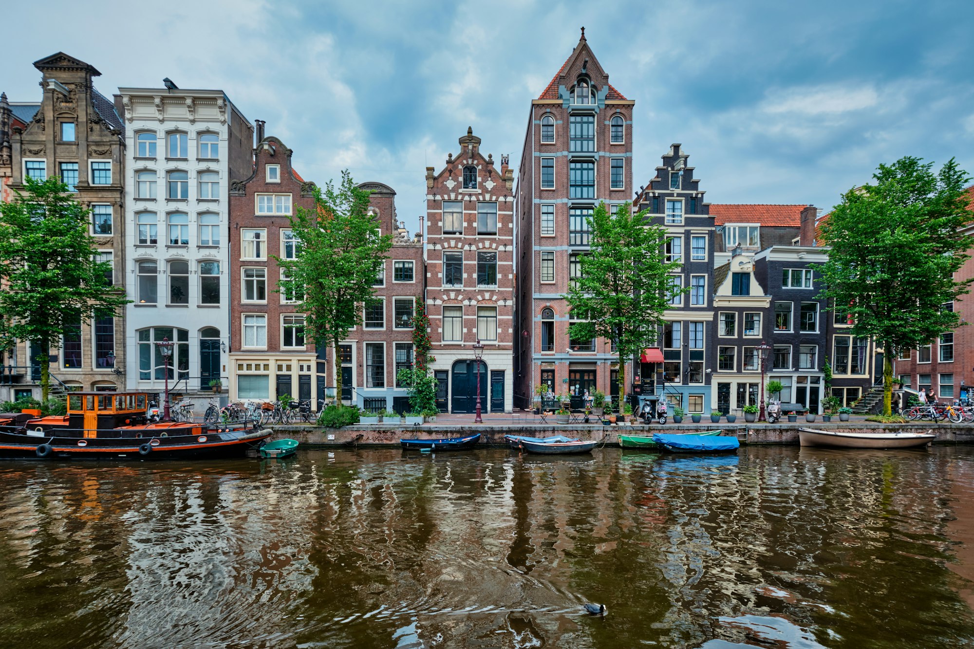 Singel canal in Amsterdam with houses. Amsterdam, Netherlands