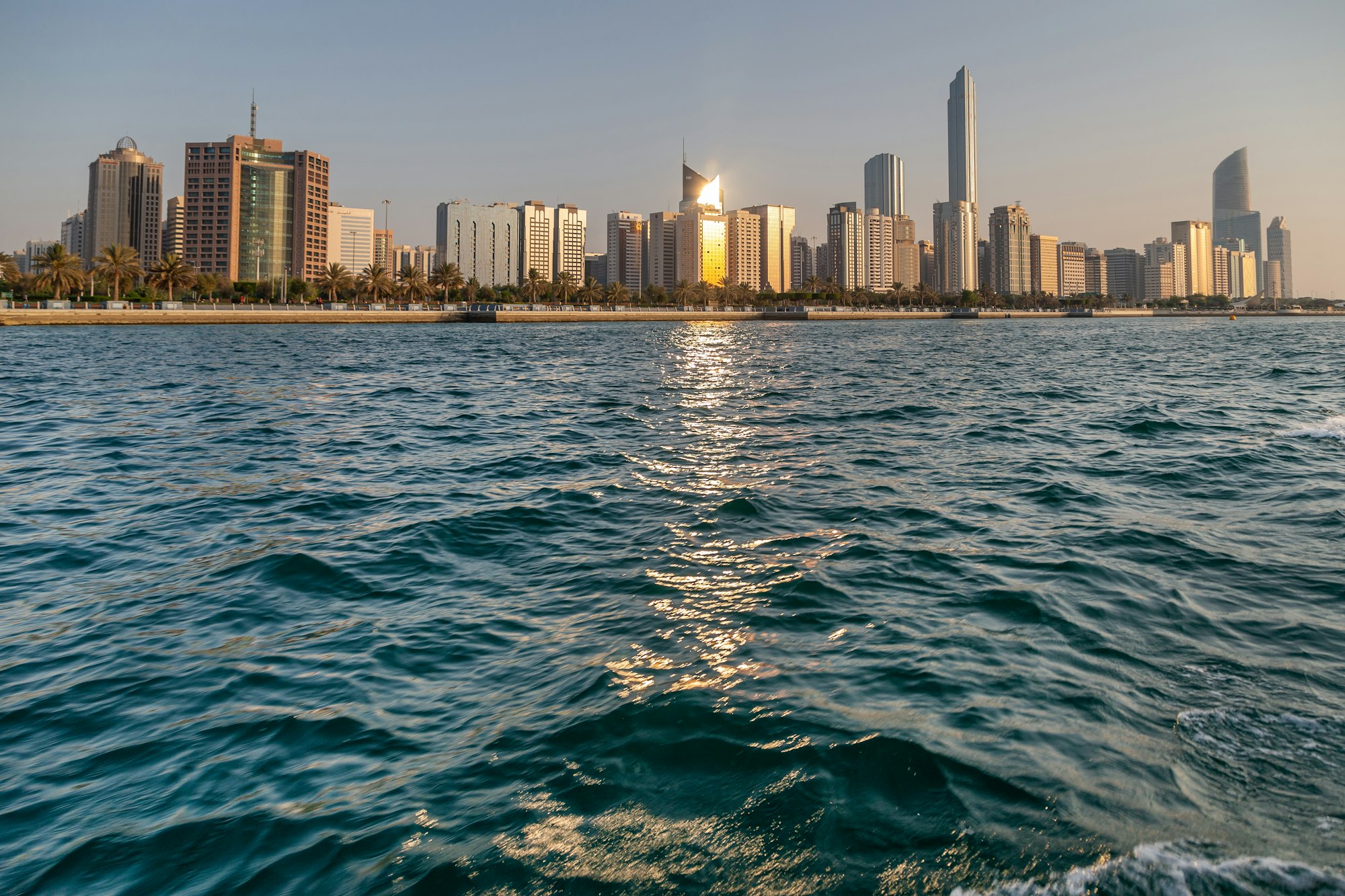 Abu Dhabi skyline at the sunset from the seaside