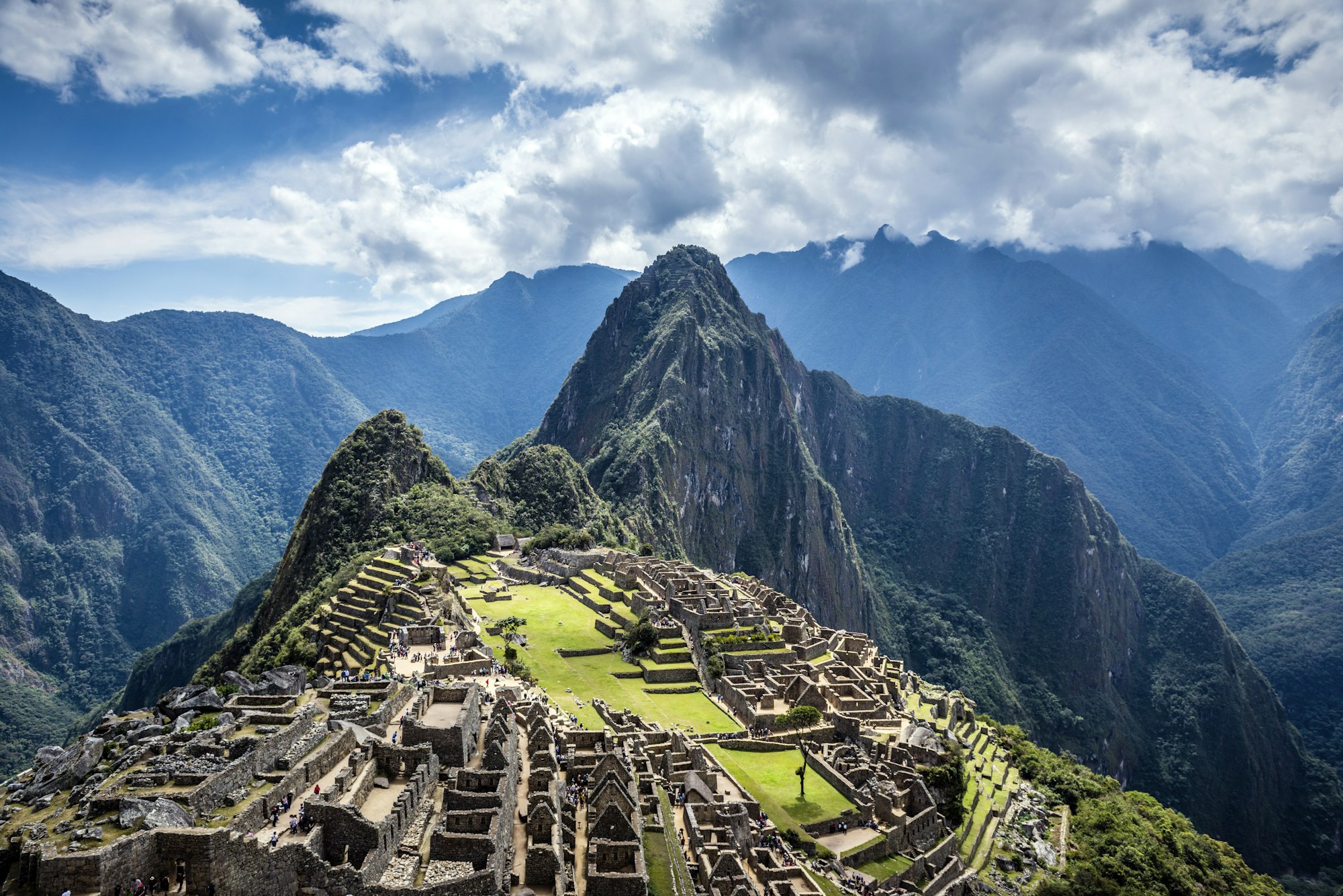 Aerial view of Macchu Picchu ruins in remote landscape, Cusco, Peru - Perú